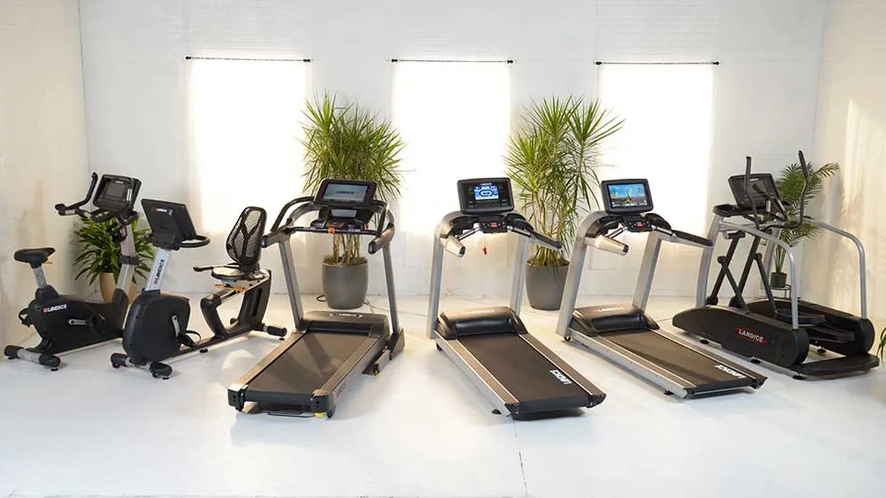 Two mint chocolate milkshakes with whipped cream and green sprinkles.